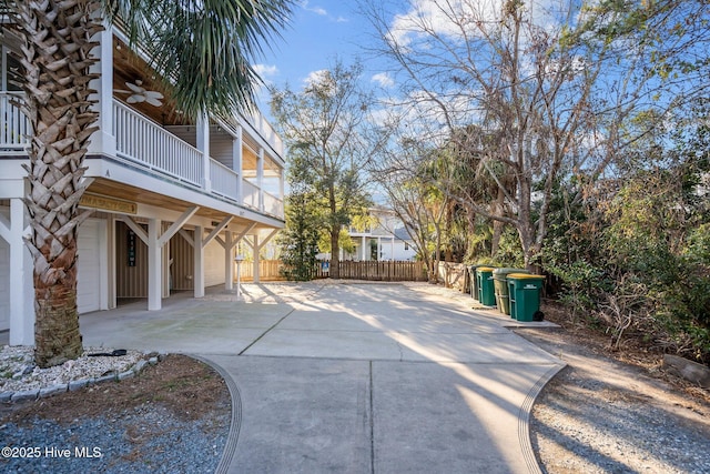 exterior space with concrete driveway