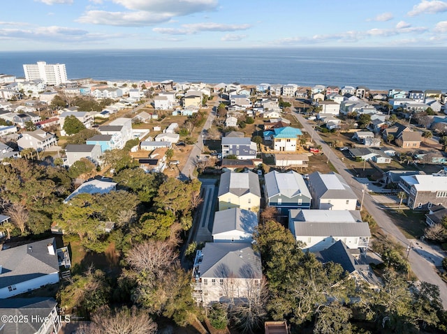 birds eye view of property featuring a water view and a residential view