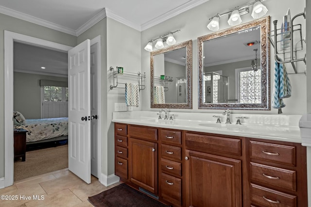 full bathroom featuring tile patterned floors, crown molding, a sink, and ensuite bathroom