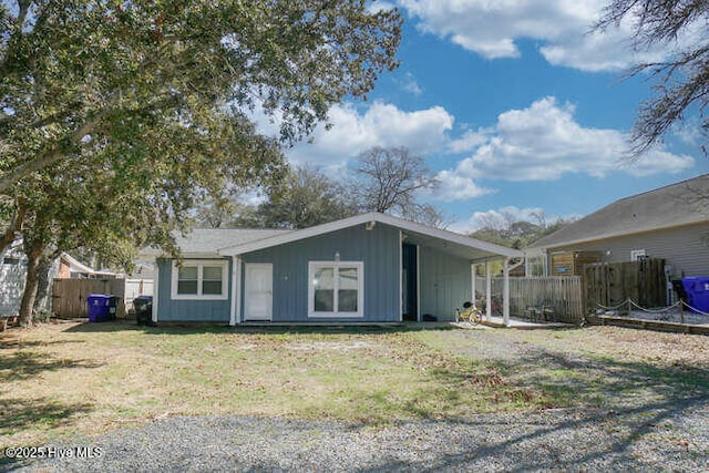 416 Trott St, Oak Island, NC 28465 - view of front facade with board and batten siding