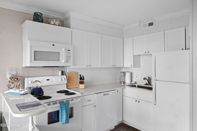 kitchen featuring white appliances, a sink, visible vents, white cabinets, and light countertops