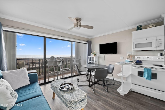 living area featuring ornamental molding, a ceiling fan, baseboards, and wood finished floors