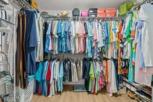 2011 Fisher St, Morehead City, NC 28557 - walk in closet featuring wood finished floors