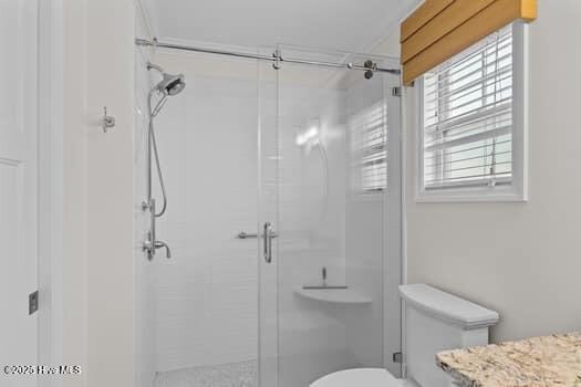 2011 Fisher St, Morehead City, NC 28557 - bathroom with a shower stall and vanity