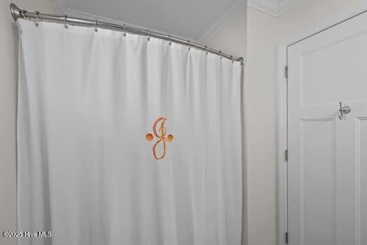 2011 Fisher St, Morehead City, NC 28557 - full bathroom with a shower with shower curtain