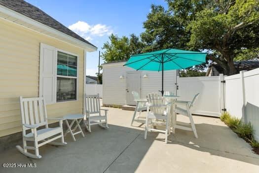 2011 Fisher St, Morehead City, NC 28557 - view of patio featuring outdoor dining area