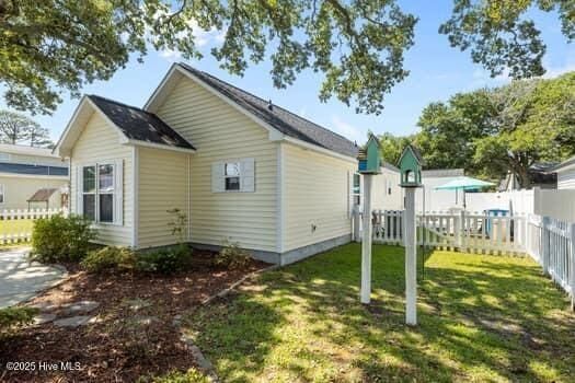 2011 Fisher St, Morehead City, NC 28557 - back of house featuring a fenced backyard