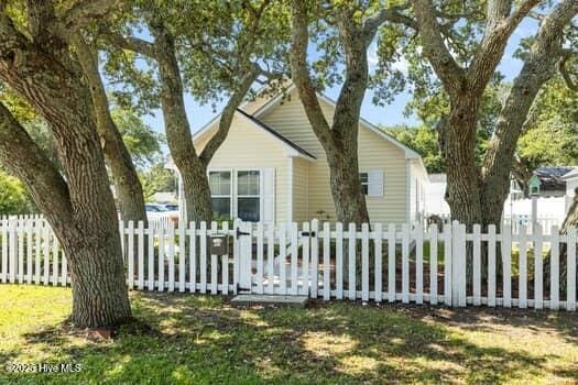 2011 Fisher St, Morehead City, NC 28557 - view of side of property with a fenced front yard