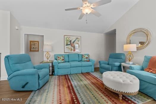 2011 Fisher St, Morehead City, NC 28557 - living area with wood finished floors, vaulted ceiling, and a ceiling fan