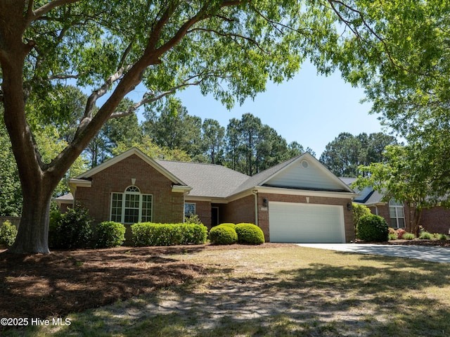 8200 Beddoes Dr, Wilmington, NC 28411 - single story home featuring concrete driveway, a shingled roof, fence, a garage, and brick siding