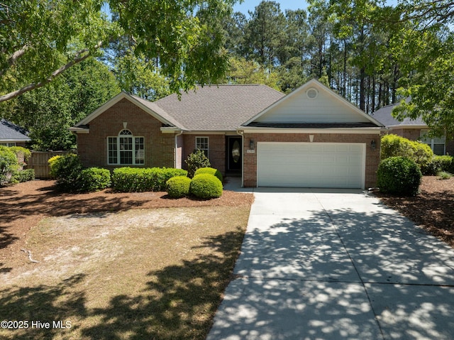 8200 Beddoes Dr, Wilmington, NC 28411 - single story home featuring concrete driveway, brick siding, and a garage