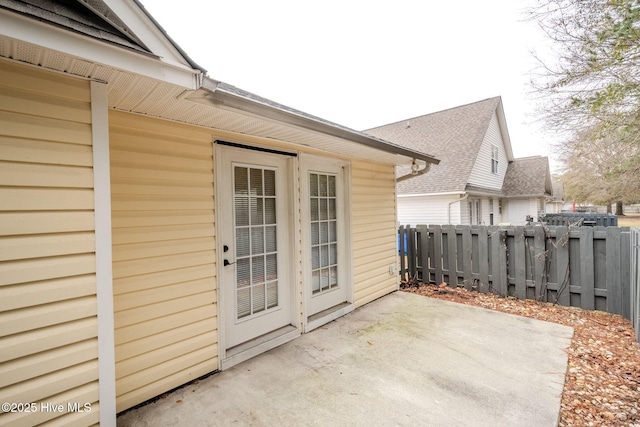 view of patio featuring fence