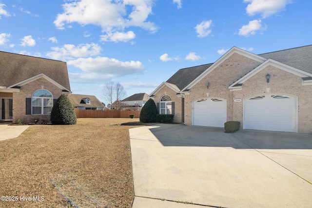 view of side of property with a garage