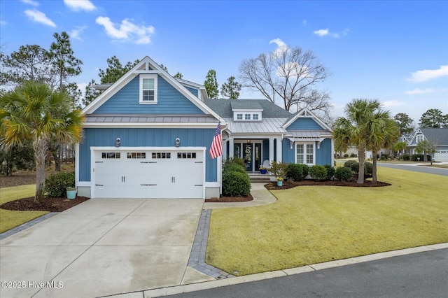 view of front facade featuring a garage and a front lawn