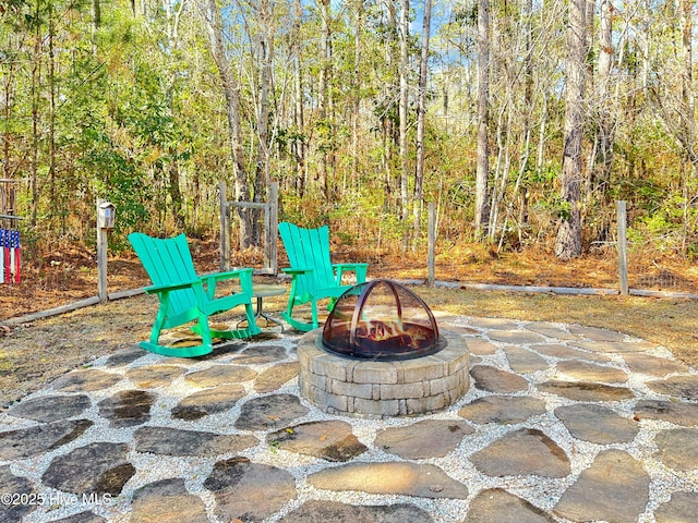 view of patio / terrace with a fire pit