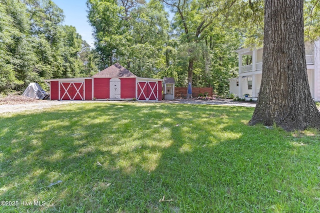 121 Dolphin Ln, Sneads Ferry, NC 28460 - view of green lawn with view of scattered trees
