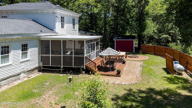121 Dolphin Ln, Sneads Ferry, NC 28460 - view of yard with a fire pit and a sunroom
