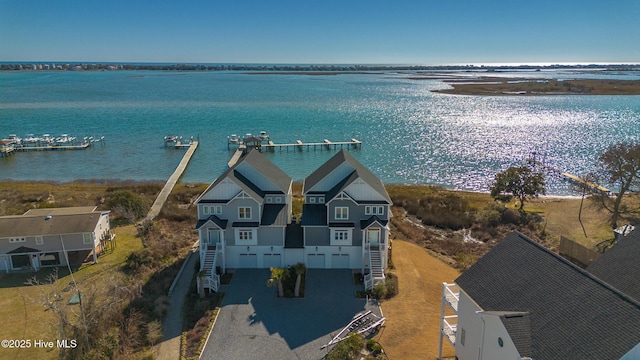 drone / aerial view featuring a water view