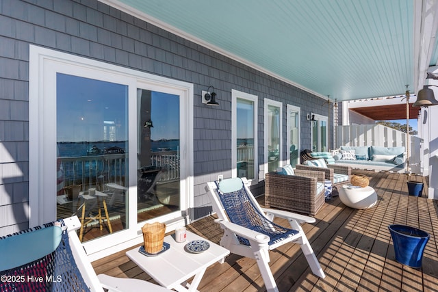 wooden deck featuring an outdoor living space