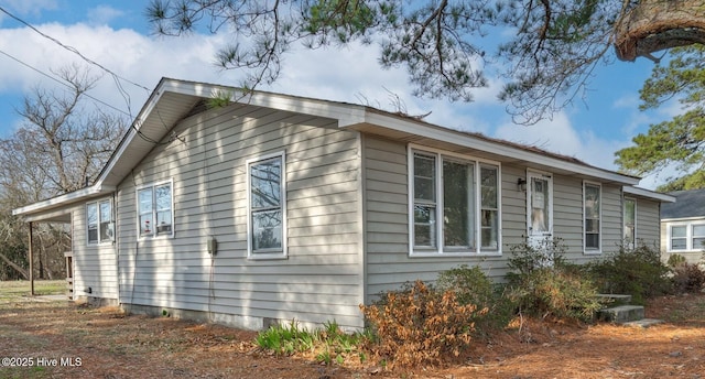 view of home's exterior featuring crawl space