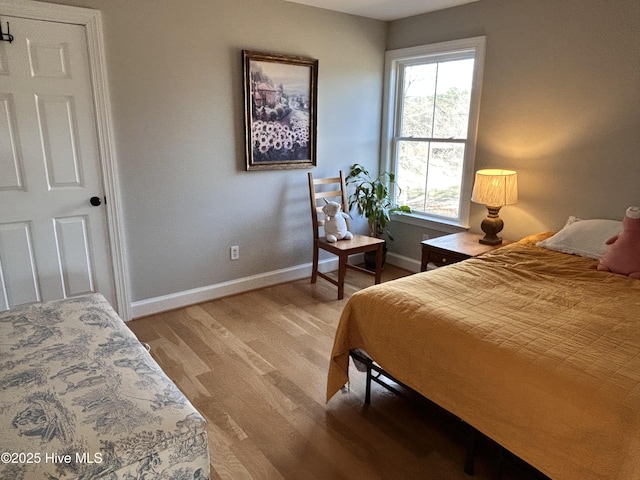 bedroom featuring light hardwood / wood-style flooring