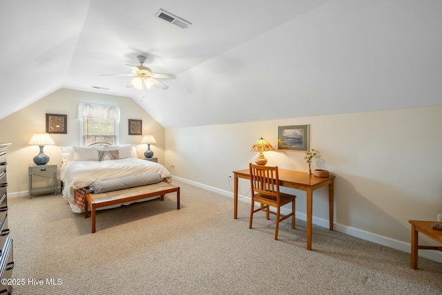 bedroom featuring vaulted ceiling, baseboards, visible vents, and carpet floors