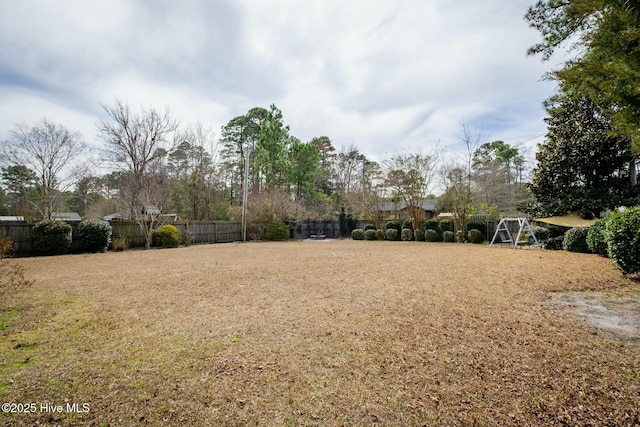 view of yard featuring fence