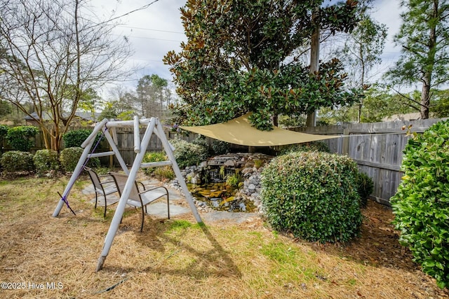 view of yard featuring fence