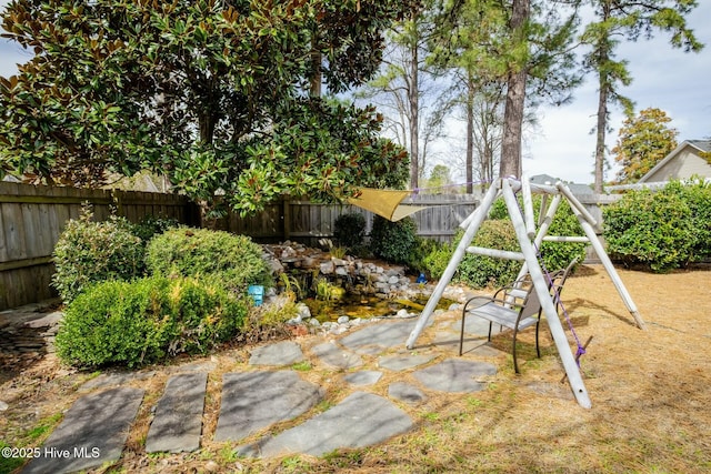 view of yard with fence