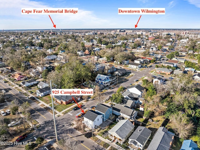 birds eye view of property with a residential view