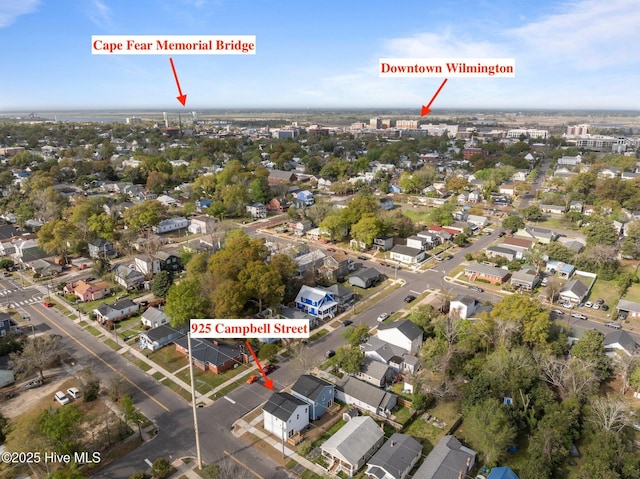 birds eye view of property with a residential view