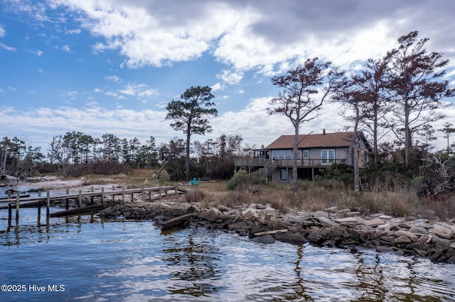 exterior space with a water view