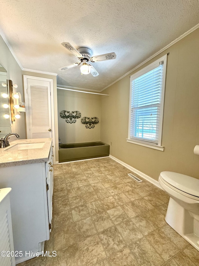 full bath with toilet, visible vents, a ceiling fan, vanity, and crown molding