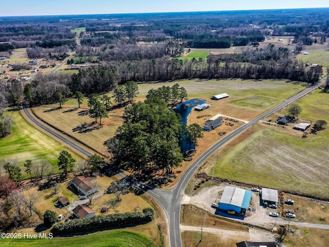 birds eye view of property featuring a rural view