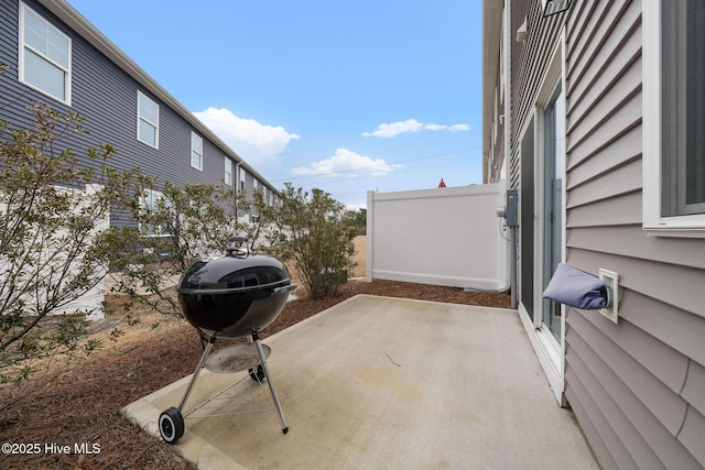 view of patio / terrace with fence and grilling area