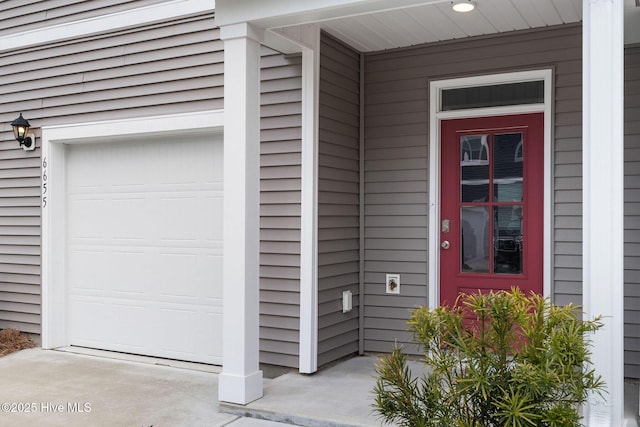 property entrance featuring a garage