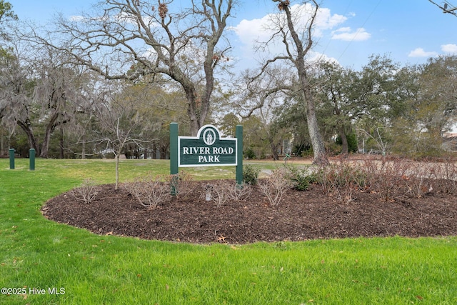 surrounding community featuring a lawn