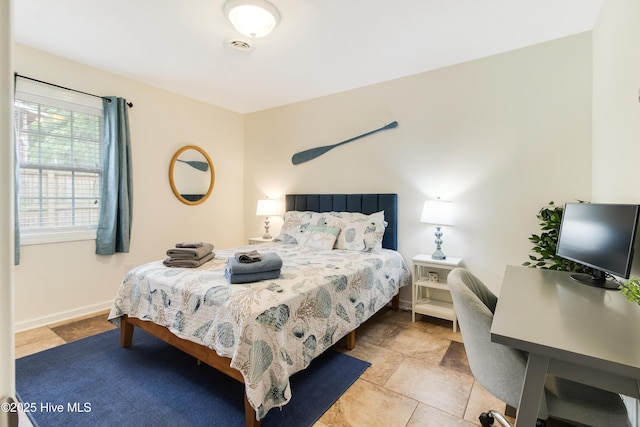 bedroom with baseboards