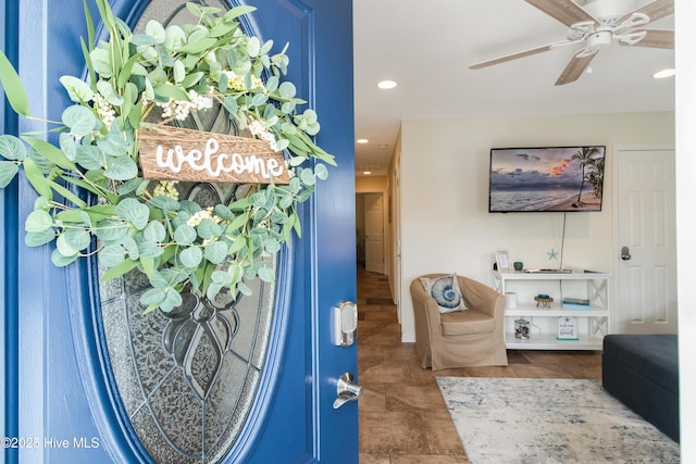 interior space with recessed lighting and a ceiling fan