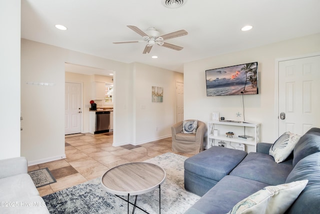 living room with visible vents, recessed lighting, and baseboards