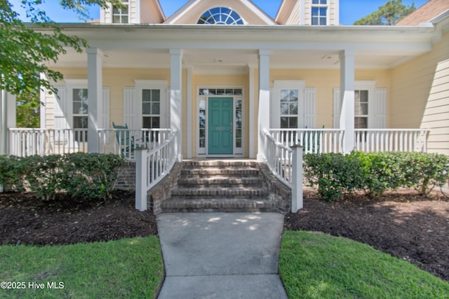 entrance to property with covered porch