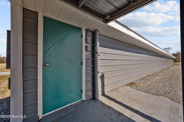 entrance to property featuring a garage