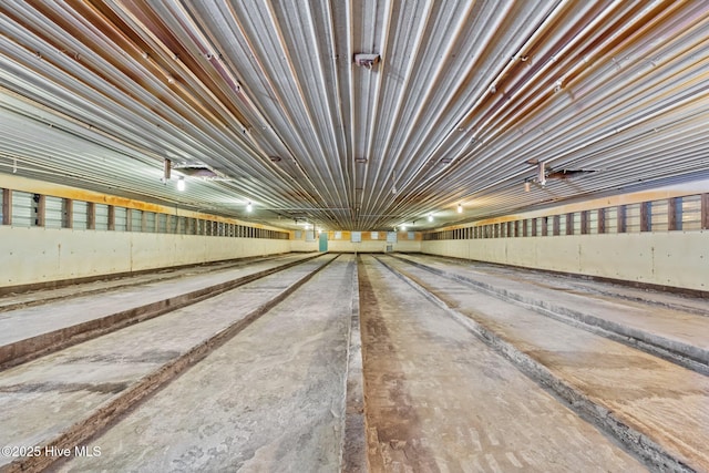 interior space featuring metal wall