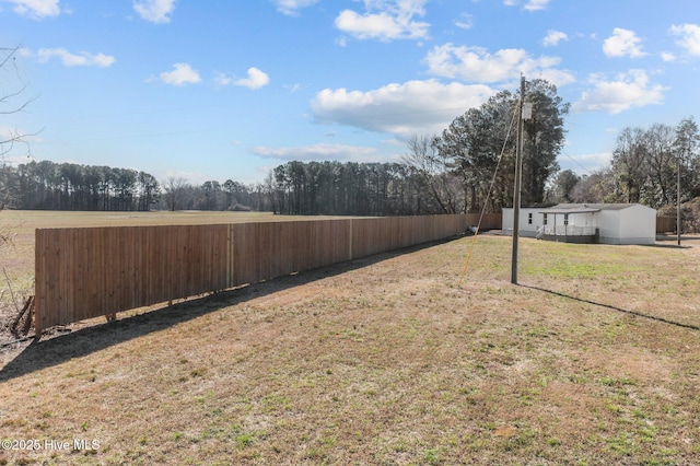 view of yard with fence