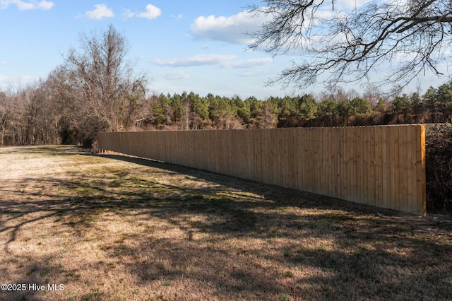 view of yard with fence