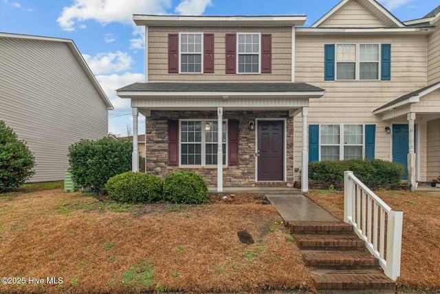 view of front of house with a front lawn