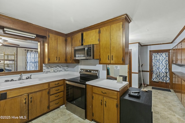 unfurnished dining area featuring crown molding, baseboards, wood finished floors, and visible vents
