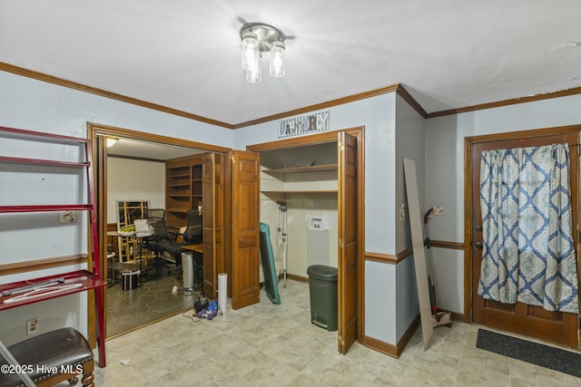 interior space with crown molding, light floors, and baseboards