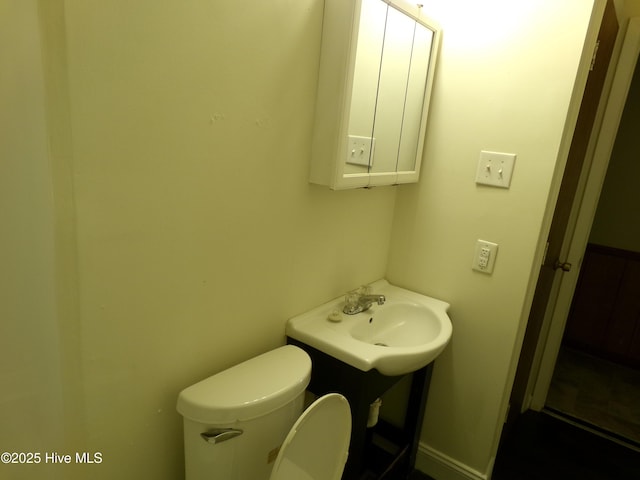 half bathroom with toilet