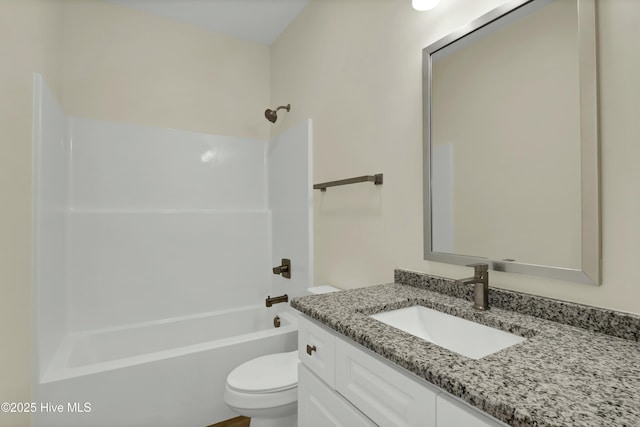 full bathroom featuring toilet, shower / bathtub combination, and vanity